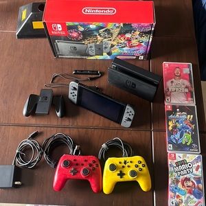 Nintendo Switch MARIO KART DELUXE gently used with wired controllers, and games